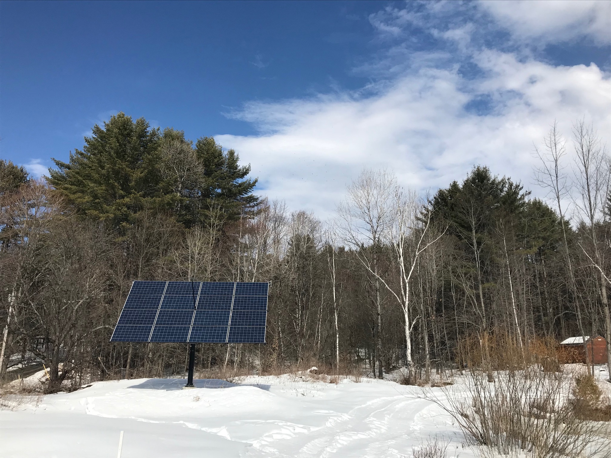 clean solar tracker in the snow
